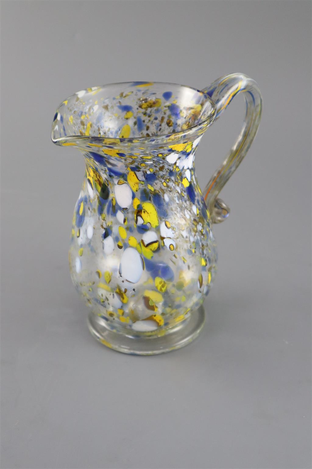 A George III yellow, blue and white marvered glass jug. c.1800, 17.5cm high